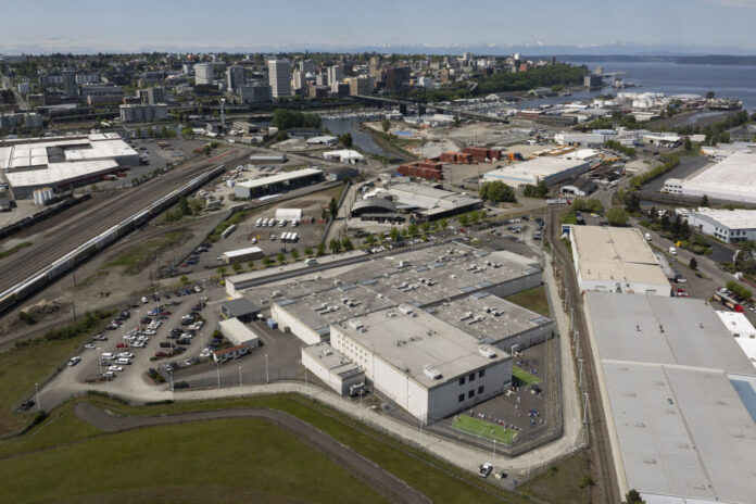 tacoma-ice-detention-center-aerial-David-Ryder-GettyImages-2212459612_hjnloh.jpg