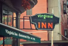 The Virginia Inn Has New Owners—the Stolen Historic Sign Is Back Up, Too